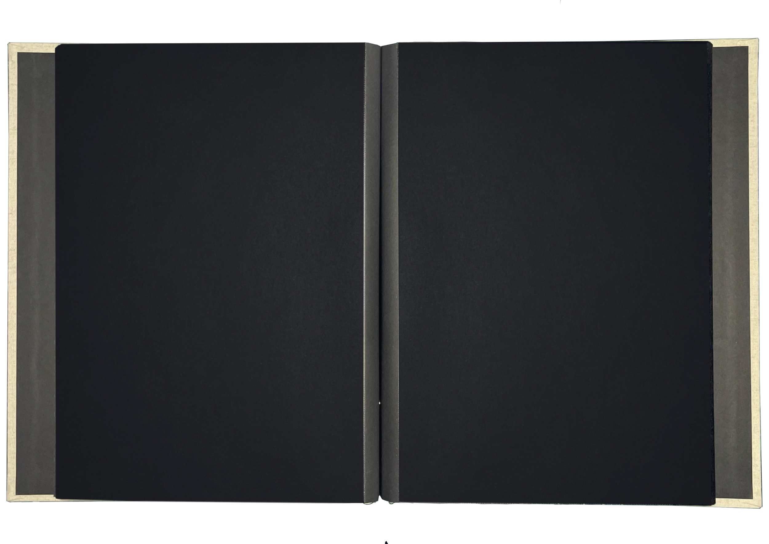 Open notebook with black pages and white borders, viewed from above.