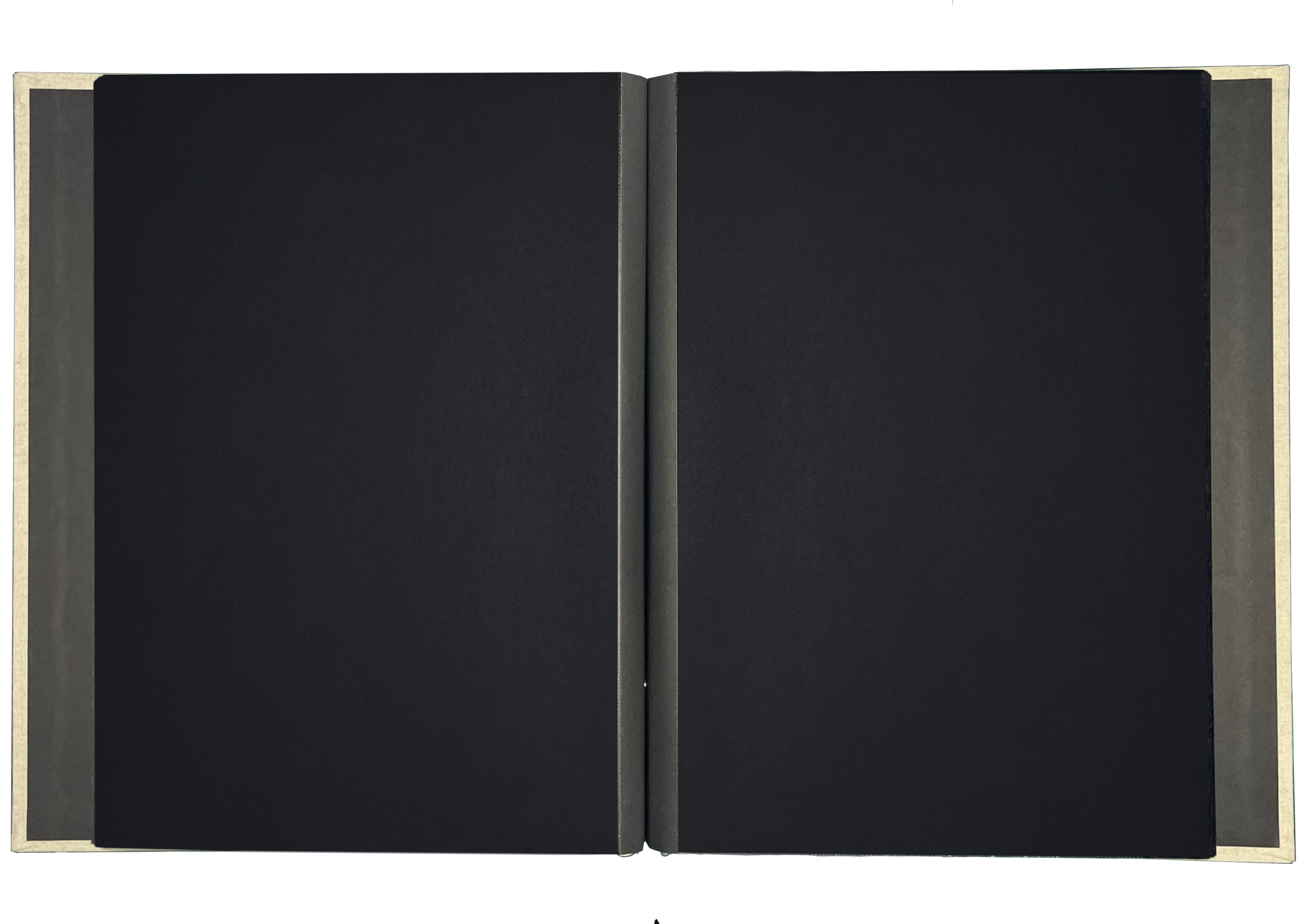 Open notebook with black pages and white borders, viewed from above.