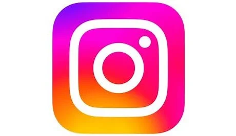 Instagram logo with a white outline on a pink, purple, orange, and yellow gradient background.