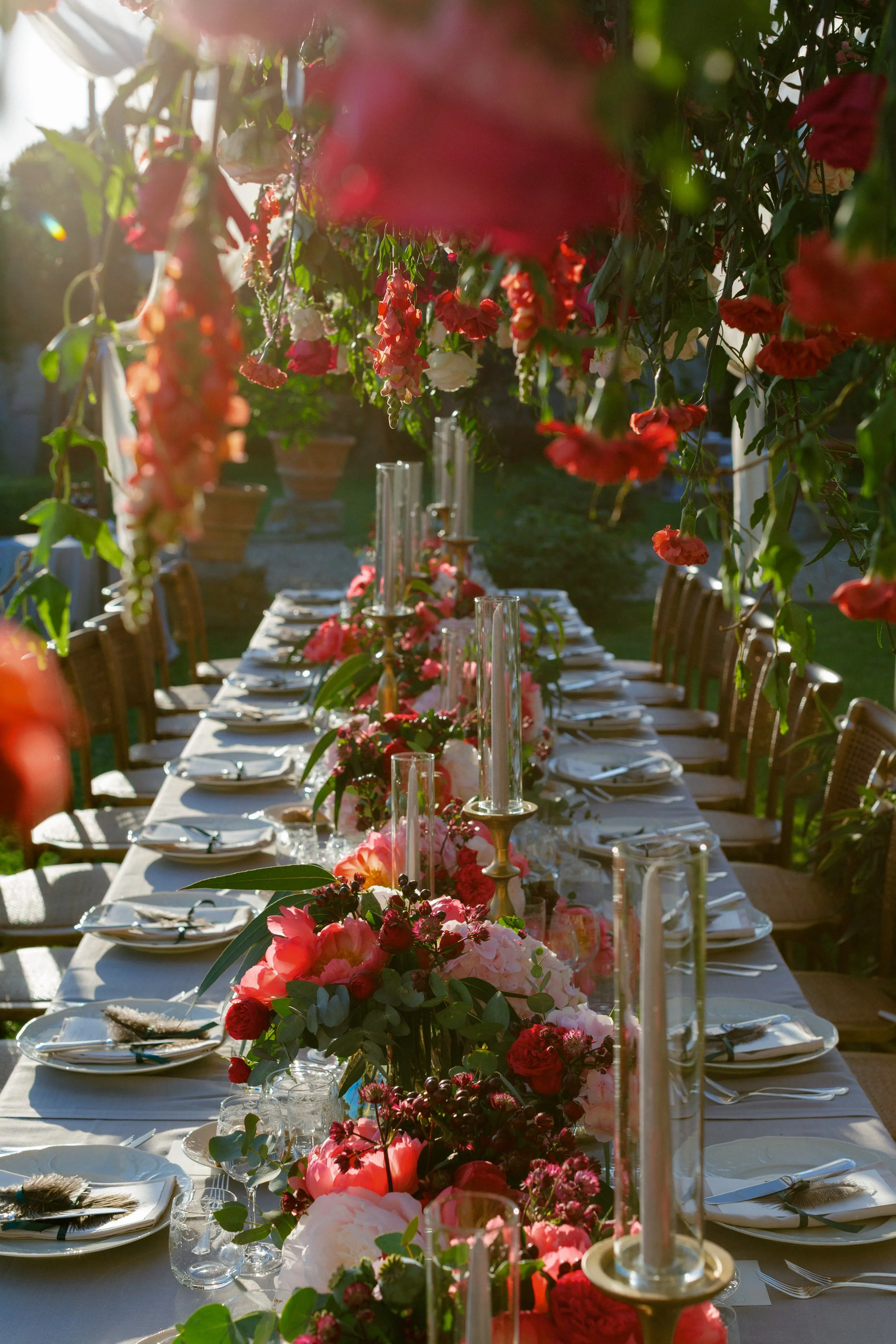 Colorful table settings at Medici Villa of Lilliano Wine Estate, for a destination wedding in Tuscany, Italy.