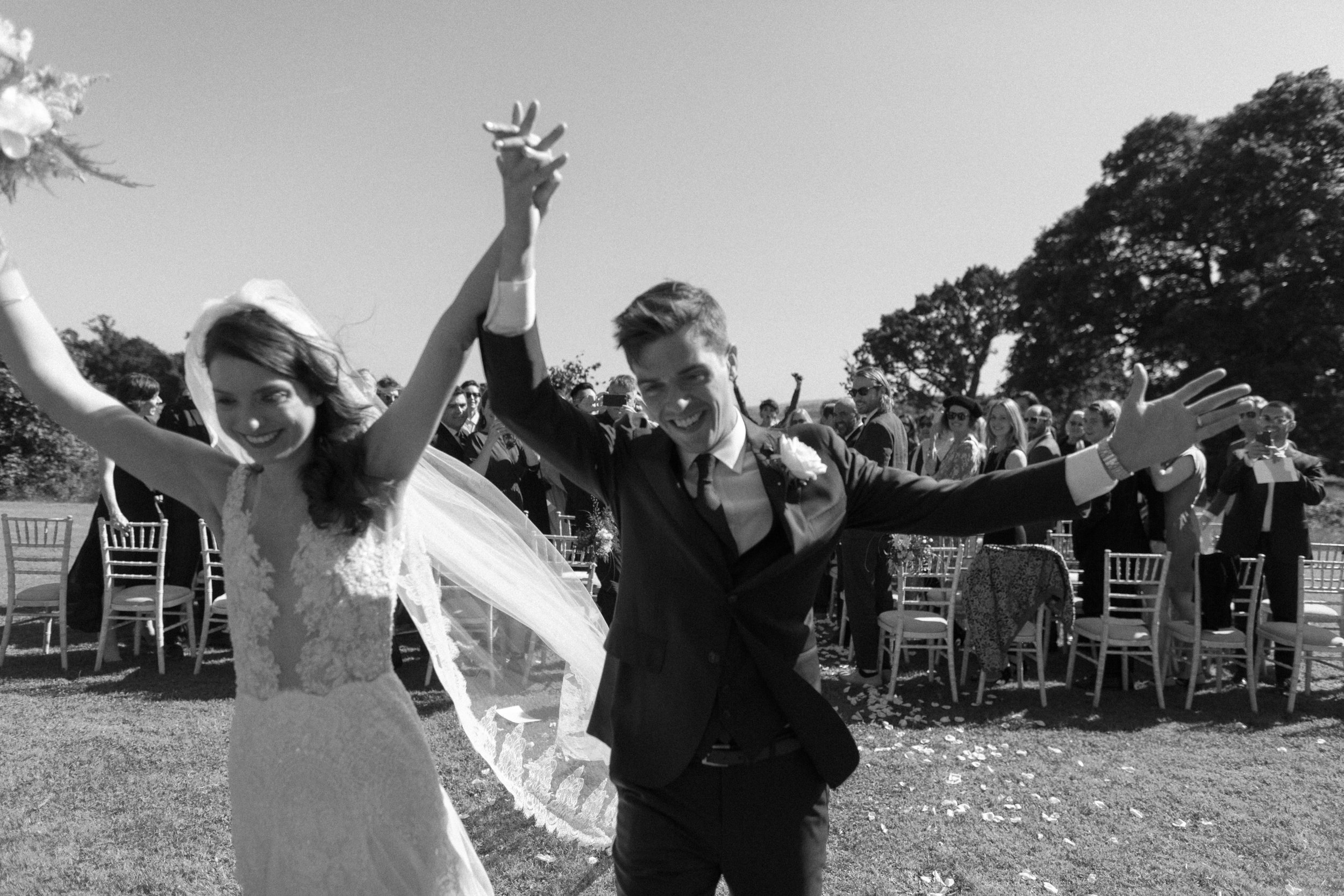 Couple celebrating after wedding ceremony at the Bell Isle Castle, Ireland.