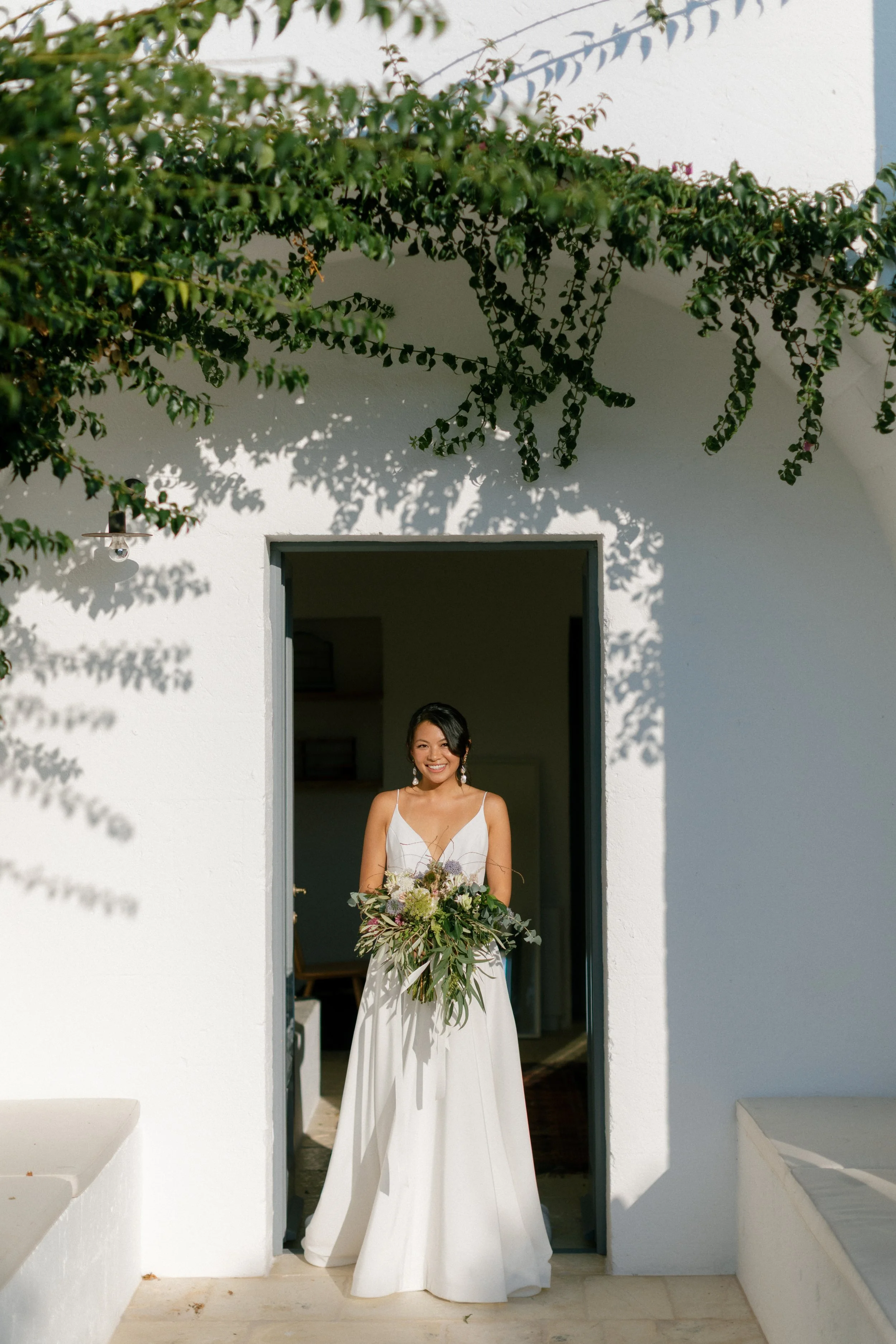Bride before the ceremony at Masseria Moroseta, Ostuni destination wedding in Italy.