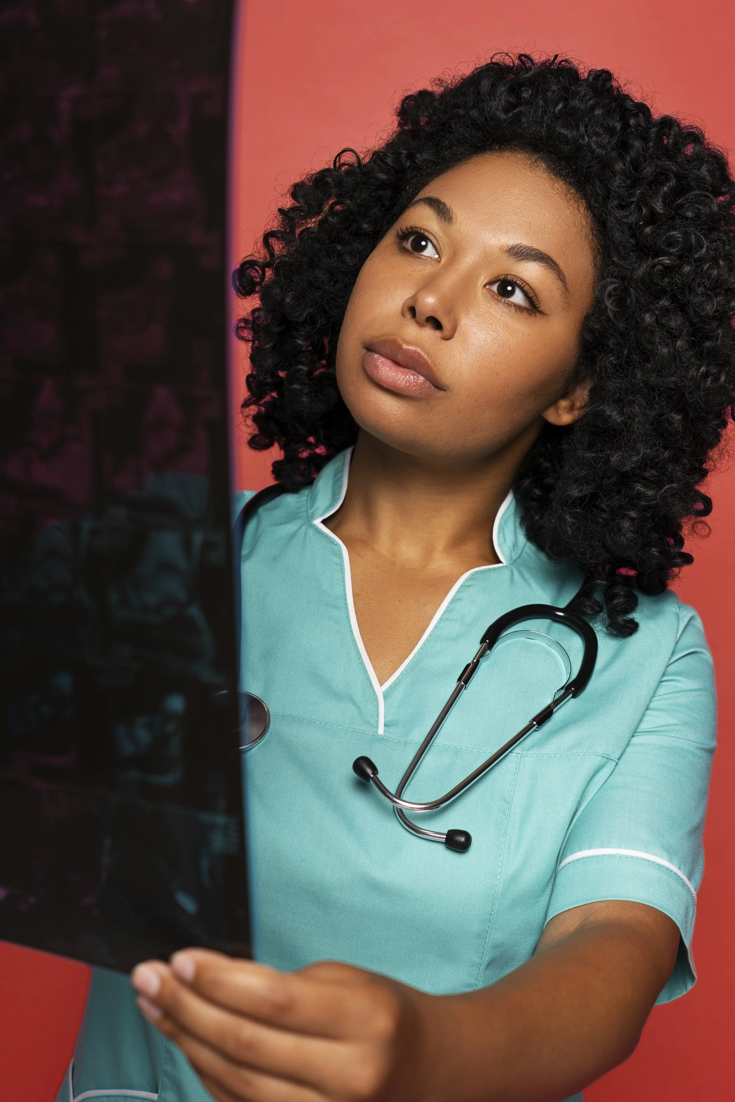An Eastern Cape Medic female looking at an x-ray