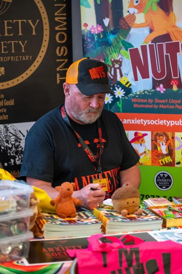 Stuart Lloyd Gould at a signing for his Nuts books