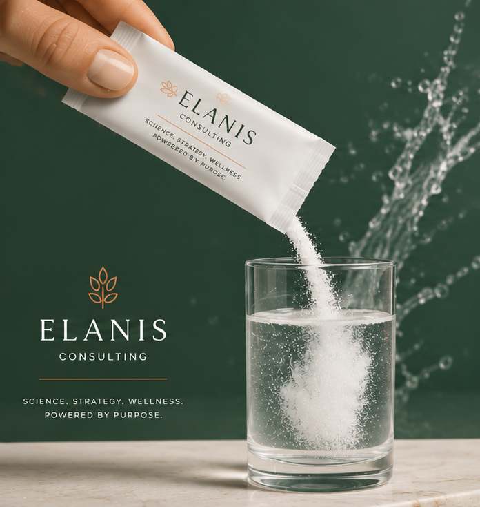 A hand pouring a white powder from a packet labeled 'Elanis Consulting' into a glass of water on a marble surface, with a green background.