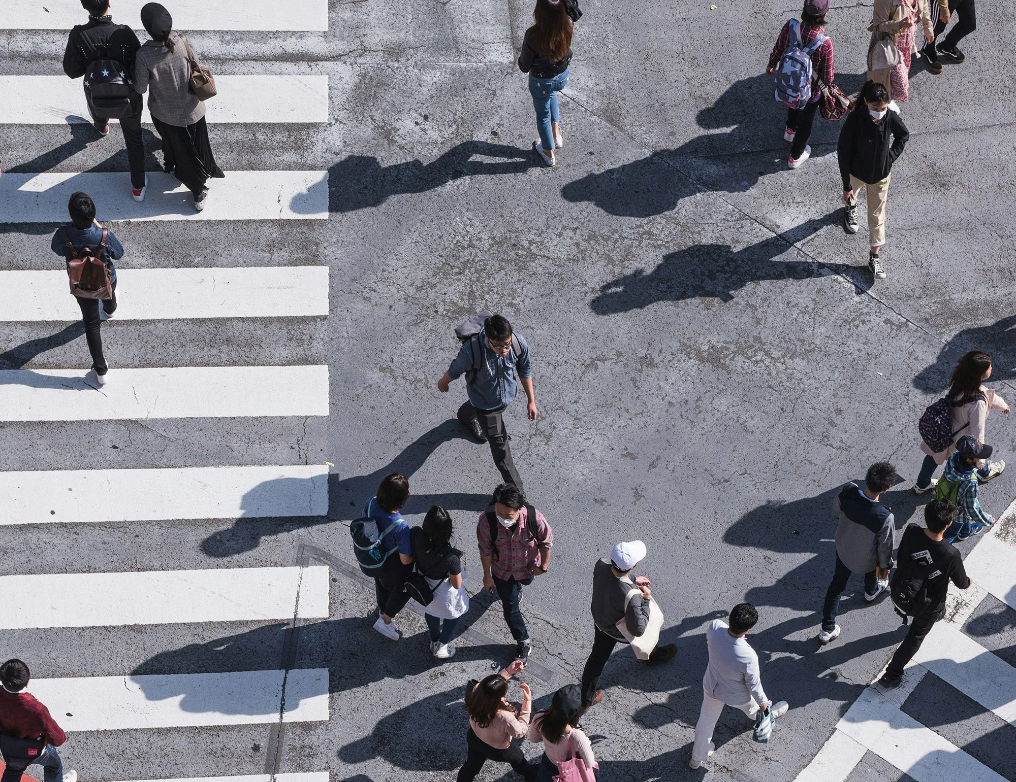 A busy scene with people moving in all directions