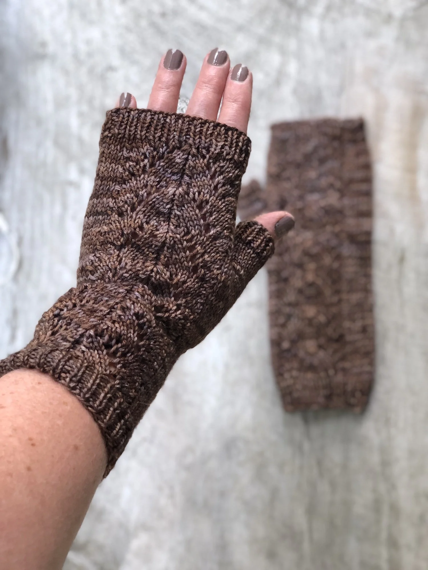 Lacey Fingerless Mitts knit in brown hand-dyed yarn.jpeg