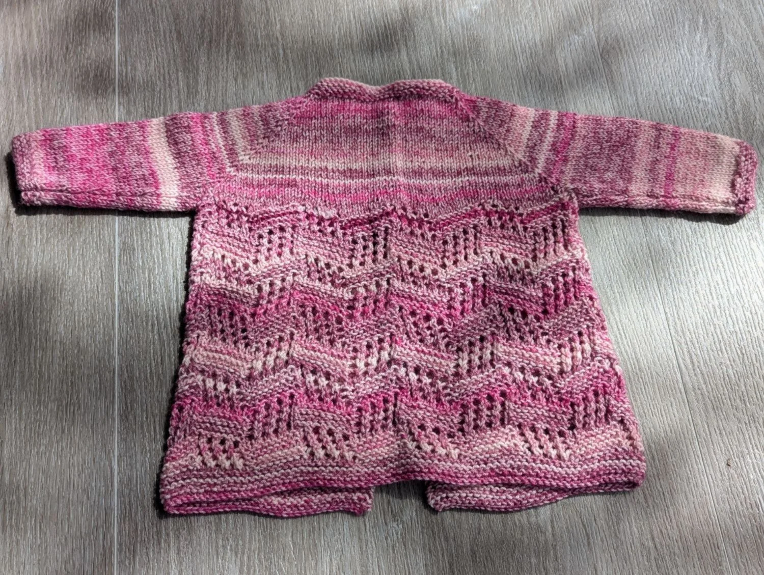 Pretty in pink baby sweater back.jpg