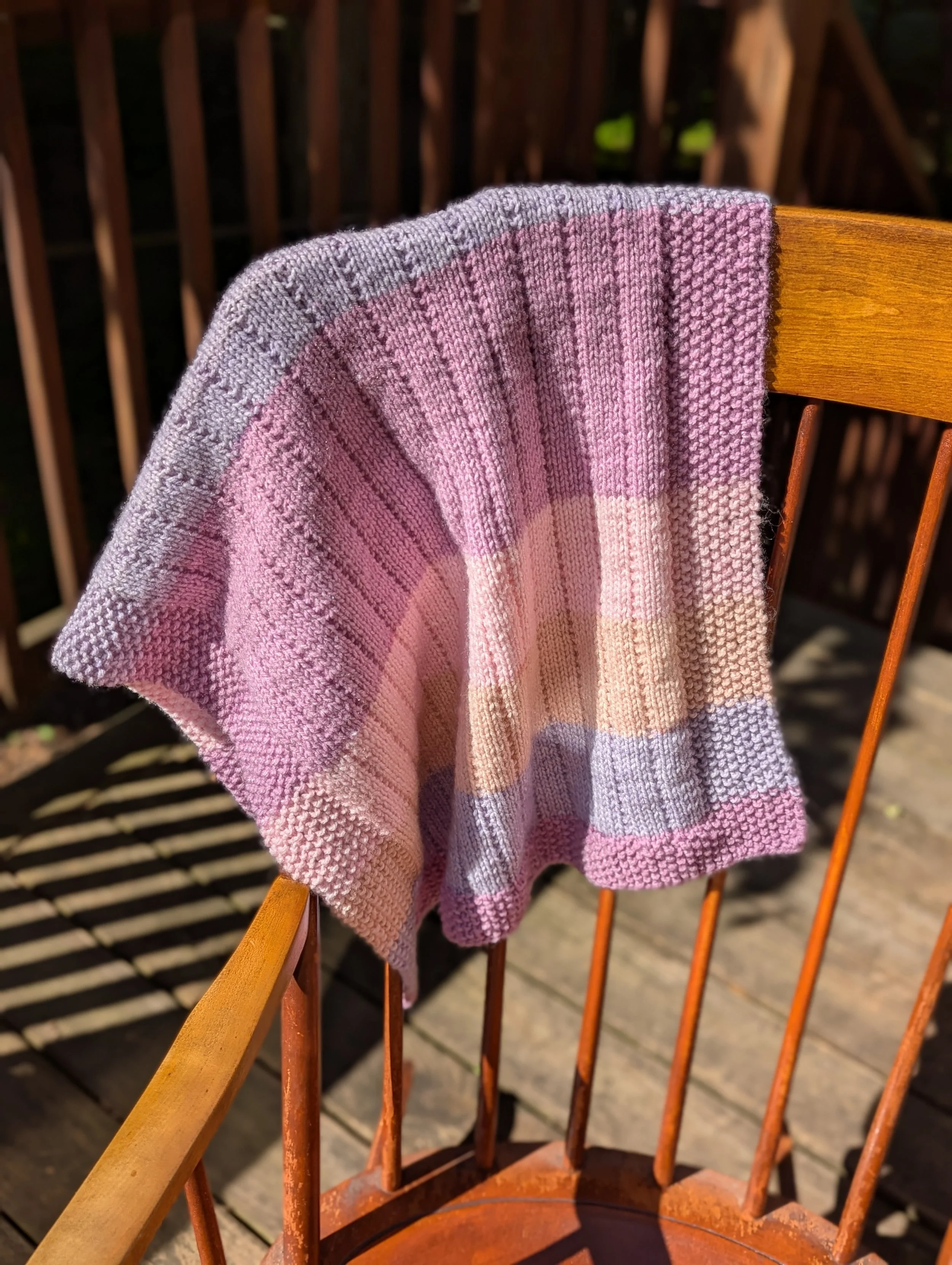 Pastel Stripes blanket - chair.jpg