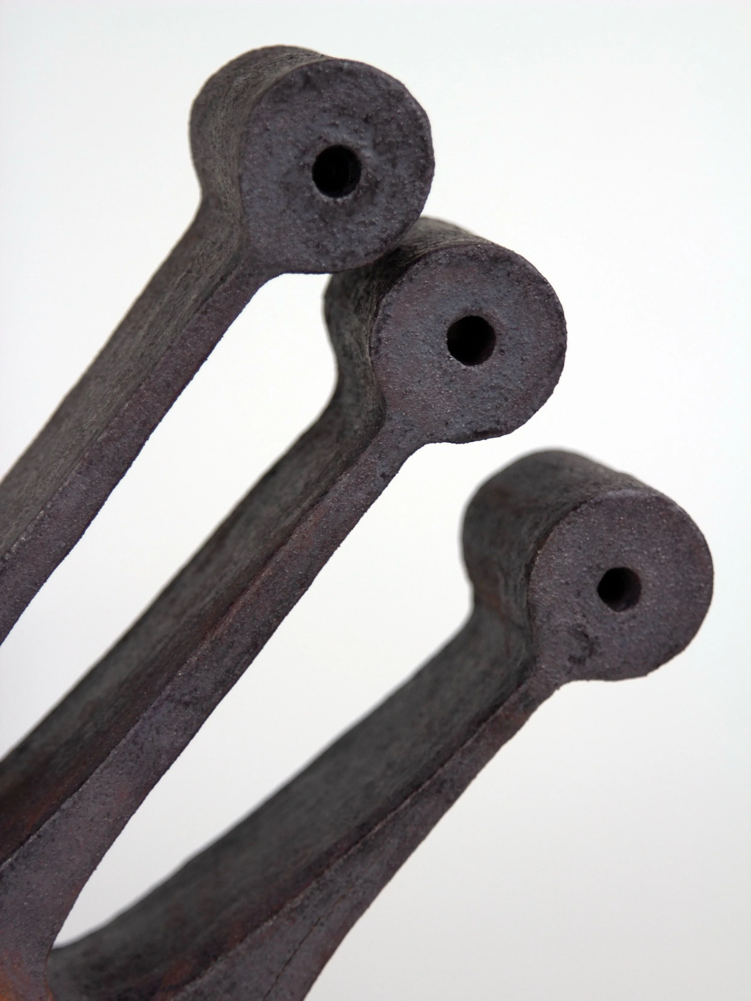 Genus III (2025) - Stoneware, iron oxide