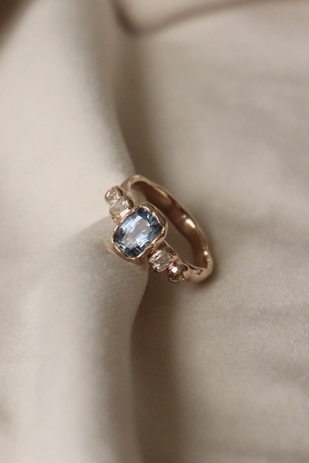 Molten Sapphire and Diamond engagement ring