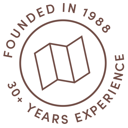 Logo with a circle and text that reads 'Founded in 1988, 30+ Years Experience', featuring an outline of a map or folded paper in the center.
