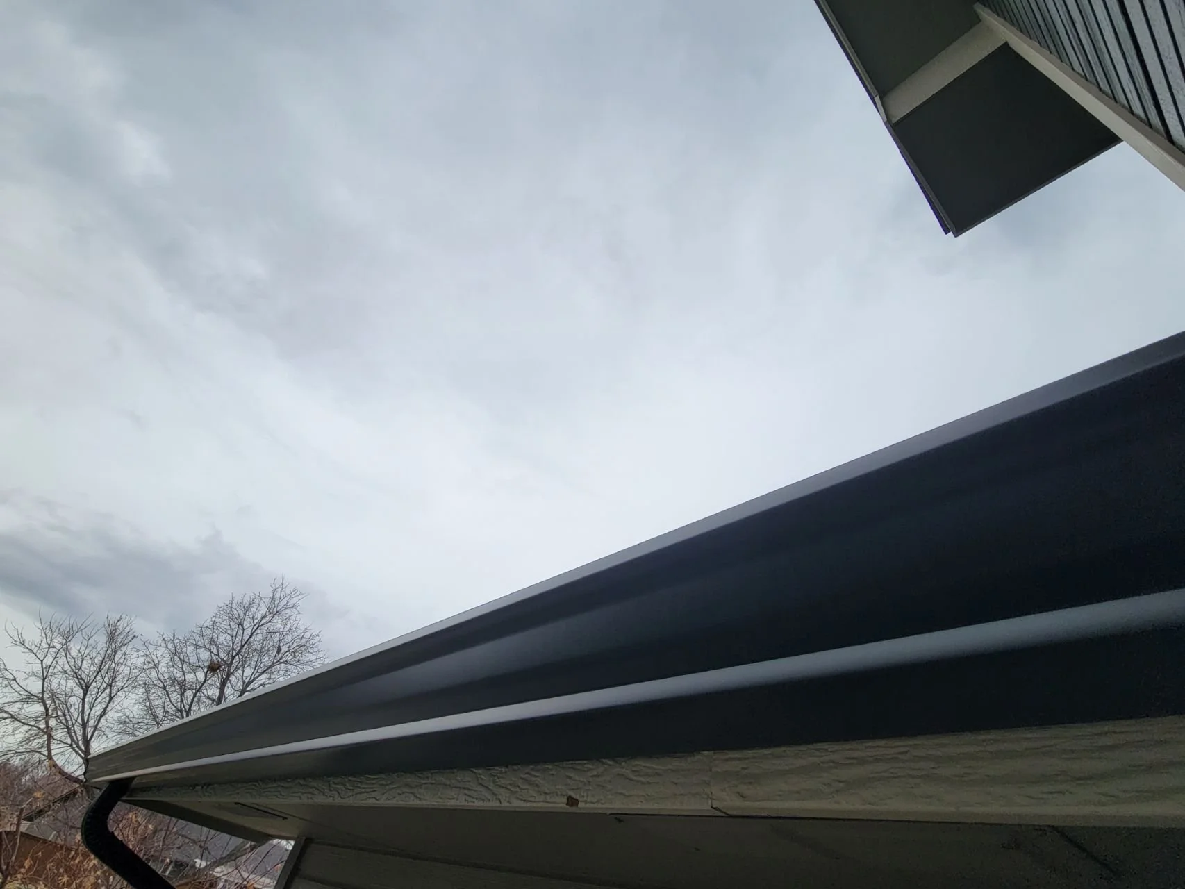 rain-gutter-and-clouds.jpg