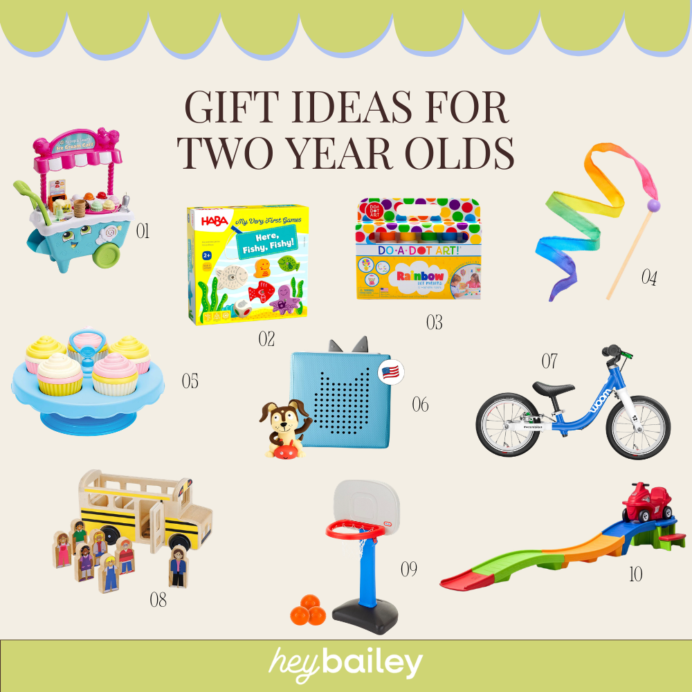 Gift ideas for two year olds featuring 10 products, including a play ice cream cart, HABA Here Fishy Fishy toddler board game, Do-A-Dot Art rainbow dot markers, rainbow ribbon wand, play cupcake stand set, Toniebox, Woom bike, and wooden bus