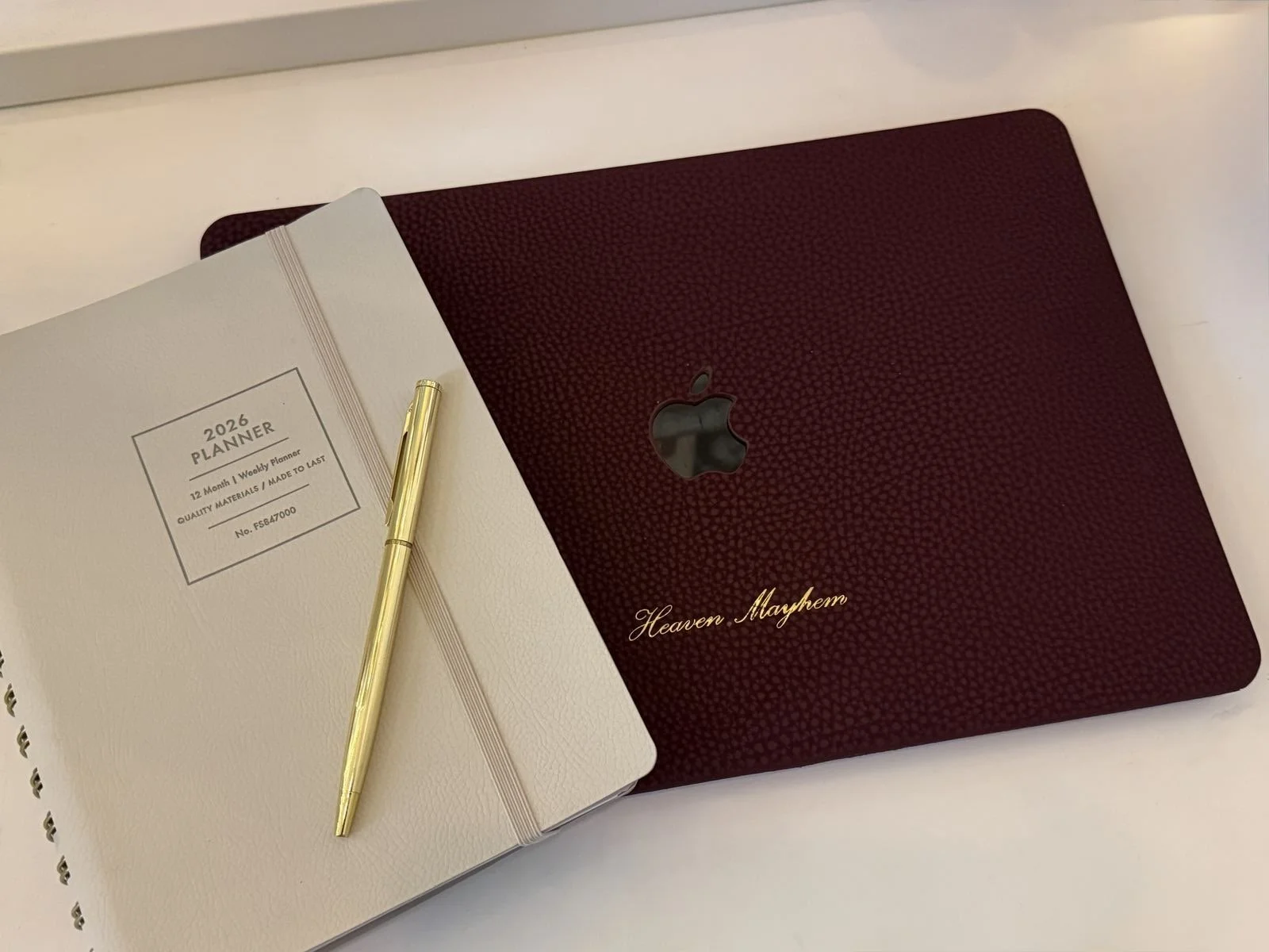 Stack of disorganized papers, documents, and folders on a flat surface.