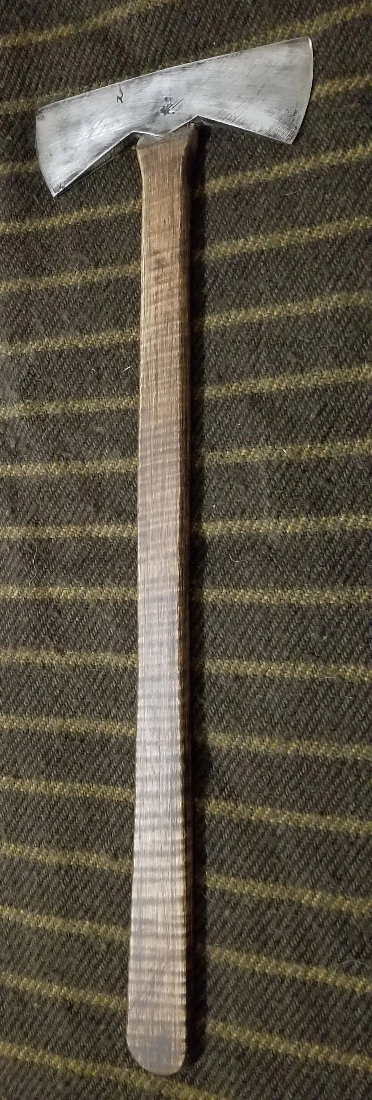 Double bit axe with high-carbon 5160 steel bit for durability and edge retention.