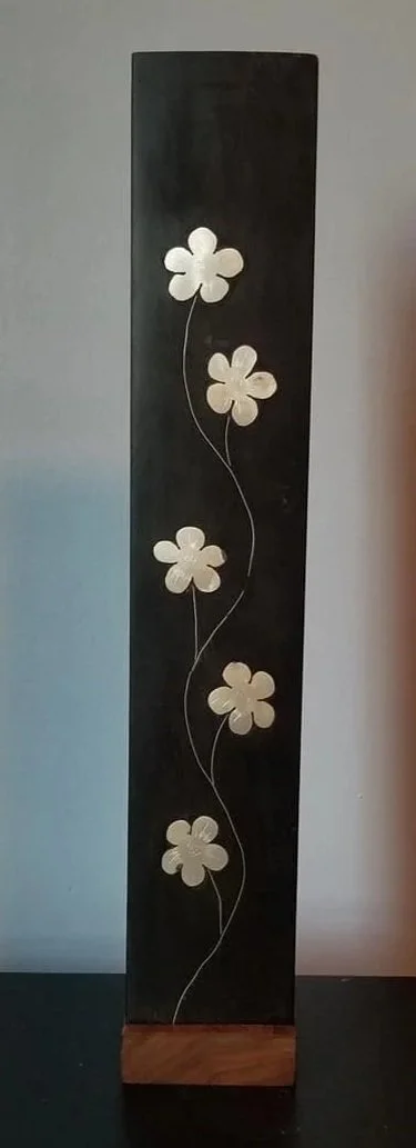 Ebony with silver flower inlay