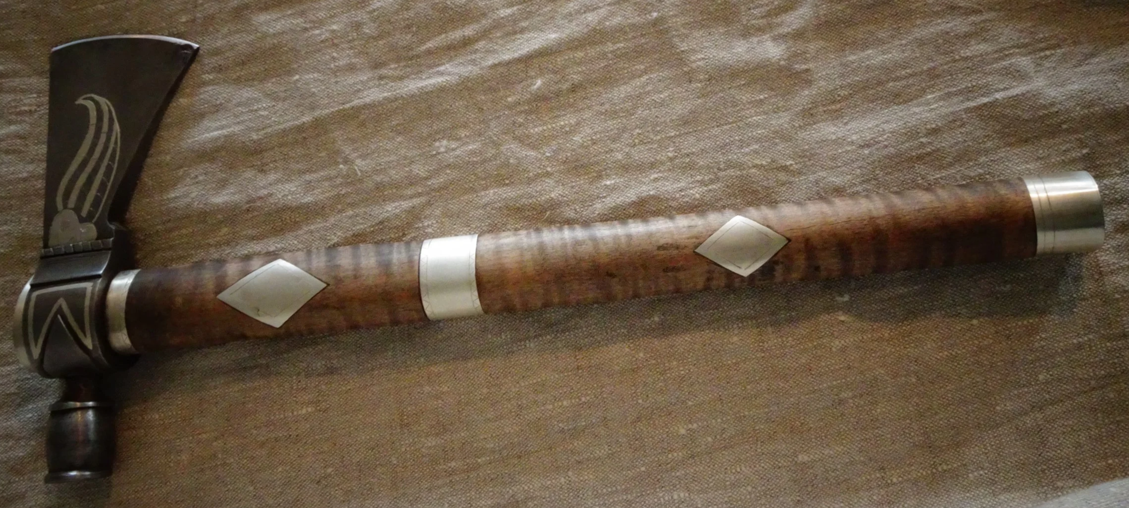 Pipe tomahawk with silver inlay on blade and handle