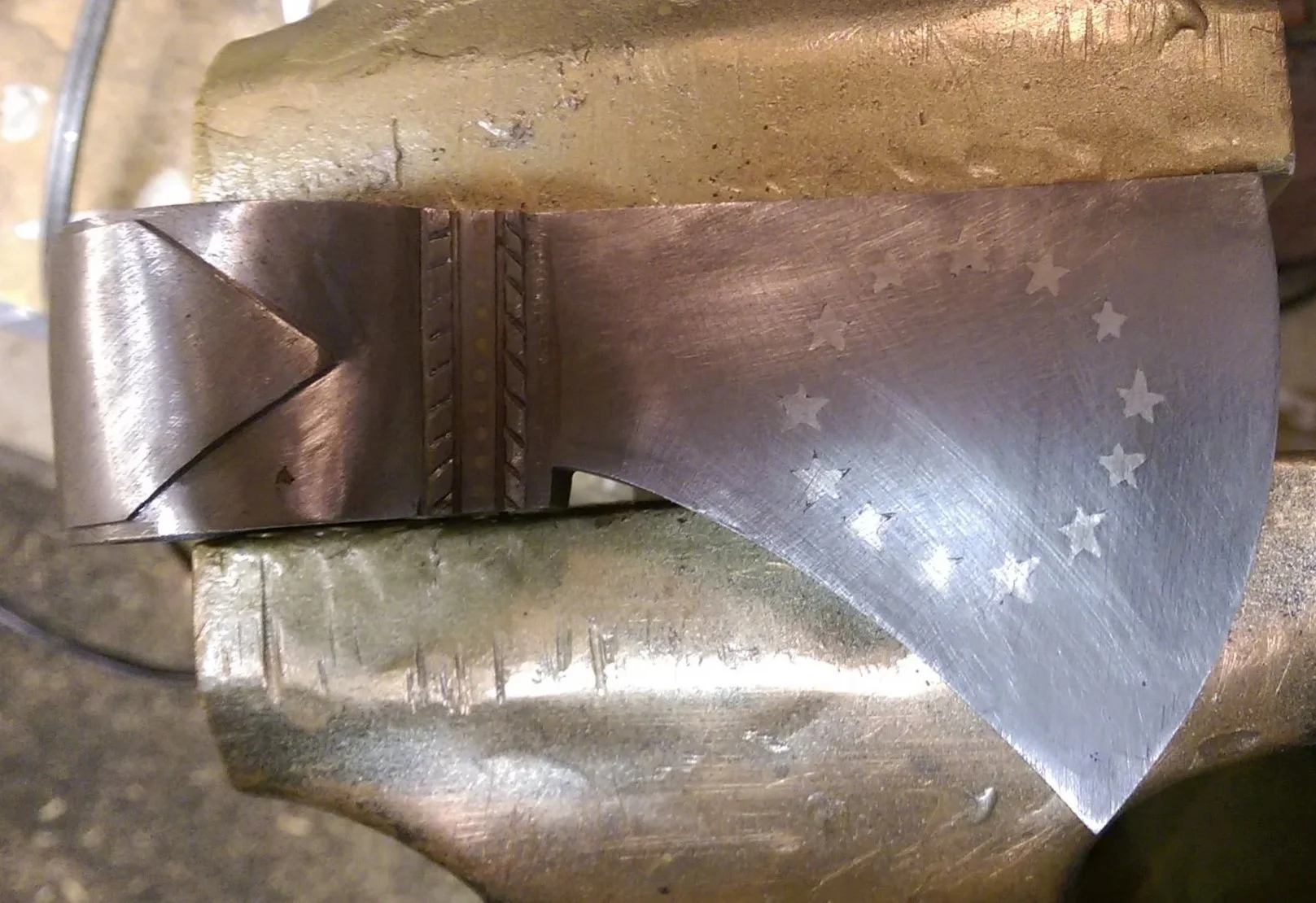 Pipe tomahawk head prepared and inlay completed - stars