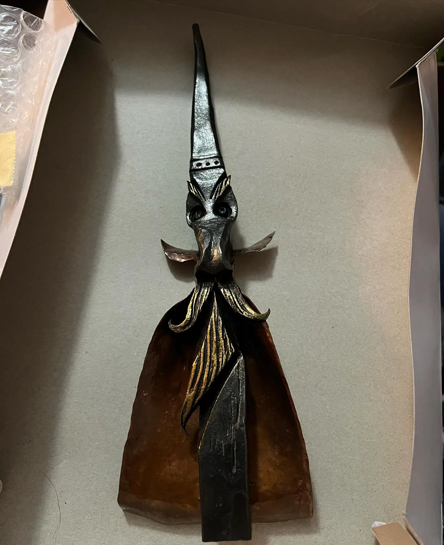 Hand-forged wizard, mixed media steel and copper.