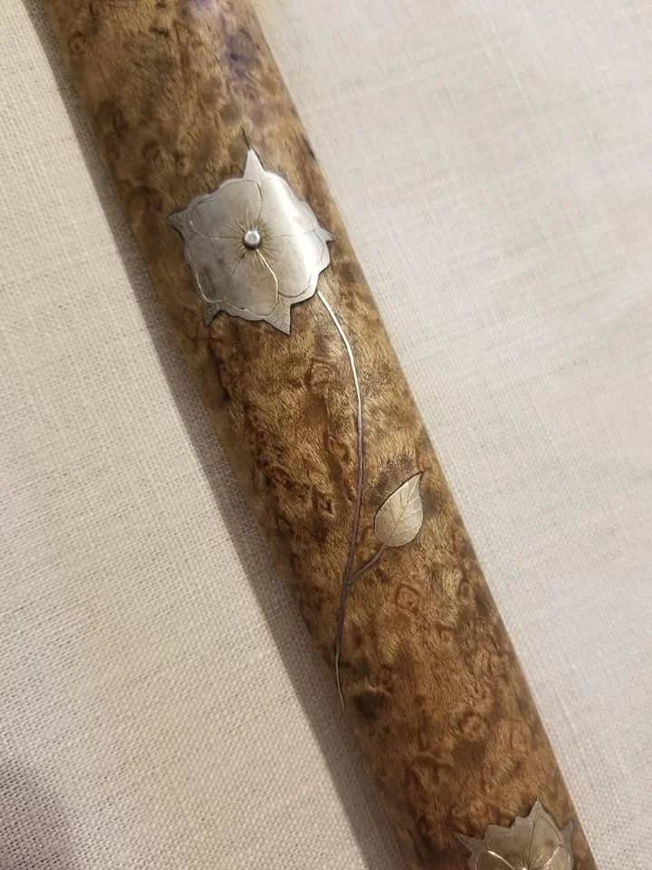 silver inaly on handle