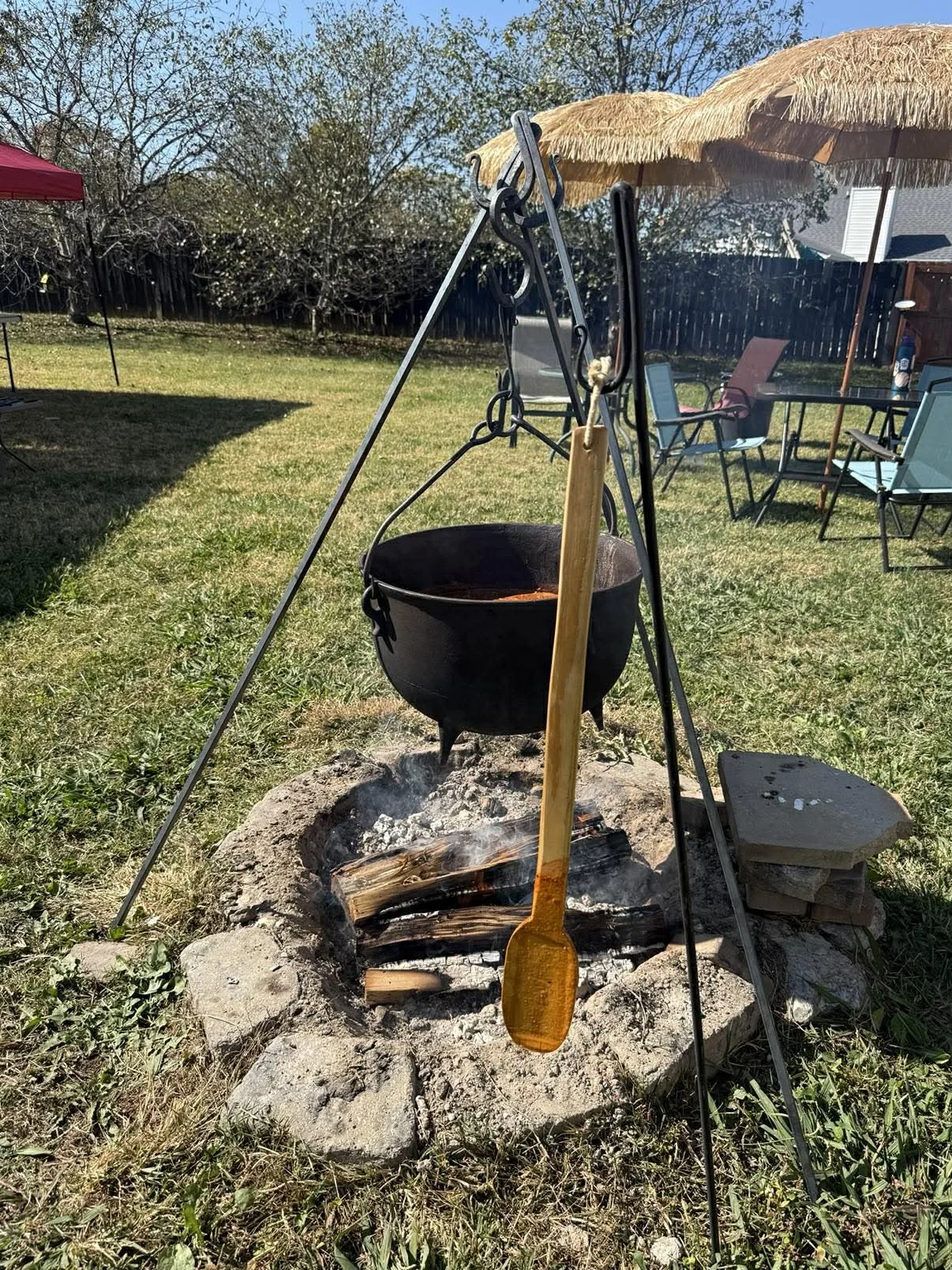 Custom Forged Tripod with Kettle Bail and S-Hook, Paired with a Wooden Spoon 