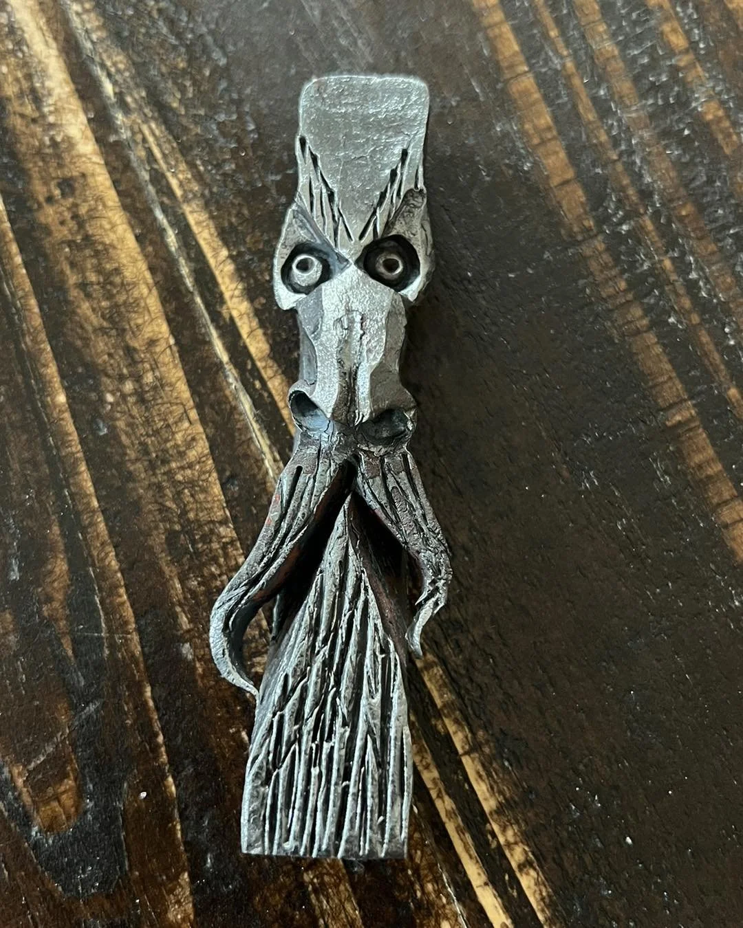 Custom-forged chess piece.