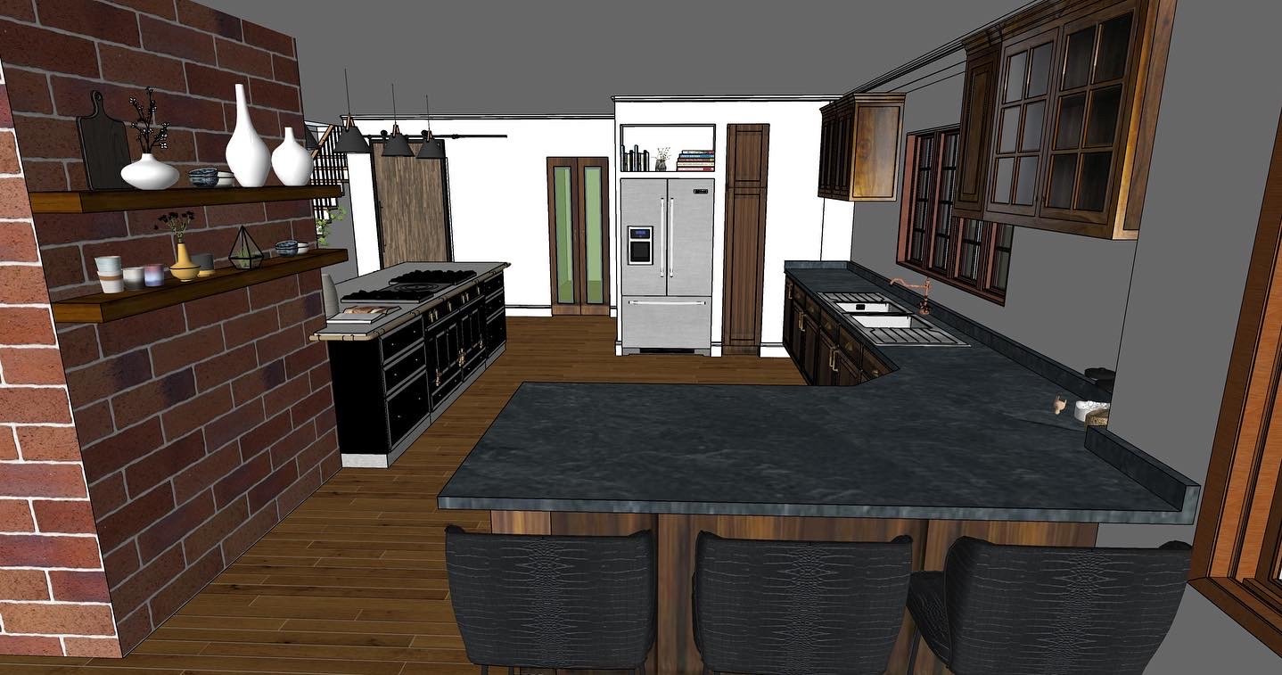 Interior view of a modern kitchen with dark wood cabinets, black countertops, a white refrigerator, and a brick accent wall with floating shelves.