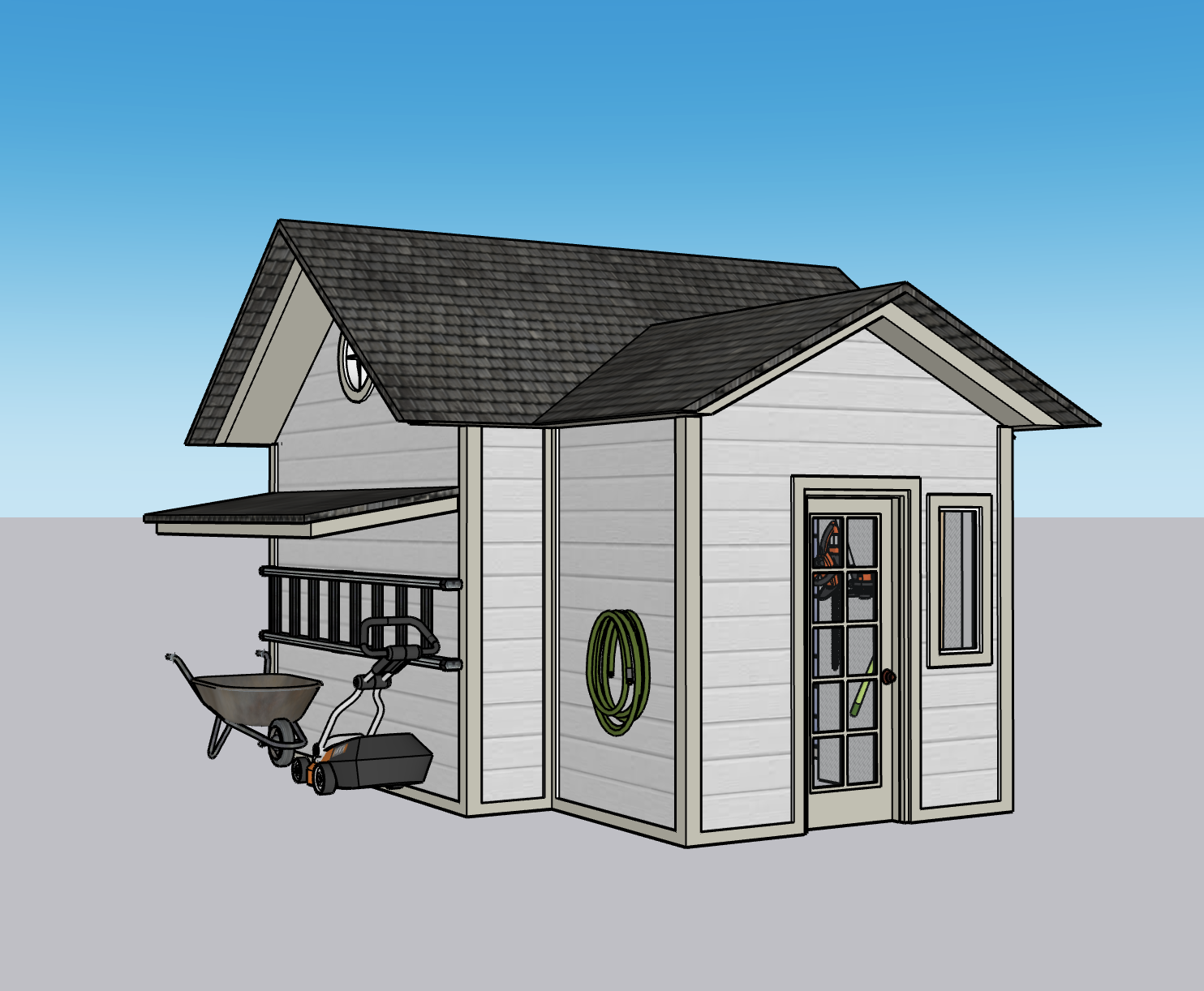 A small white shed with a black shingled roof, glass-paneled door, and window, with a green garden hose hanging on the wall and garden tools including a wheelbarrow and lawnmower outside