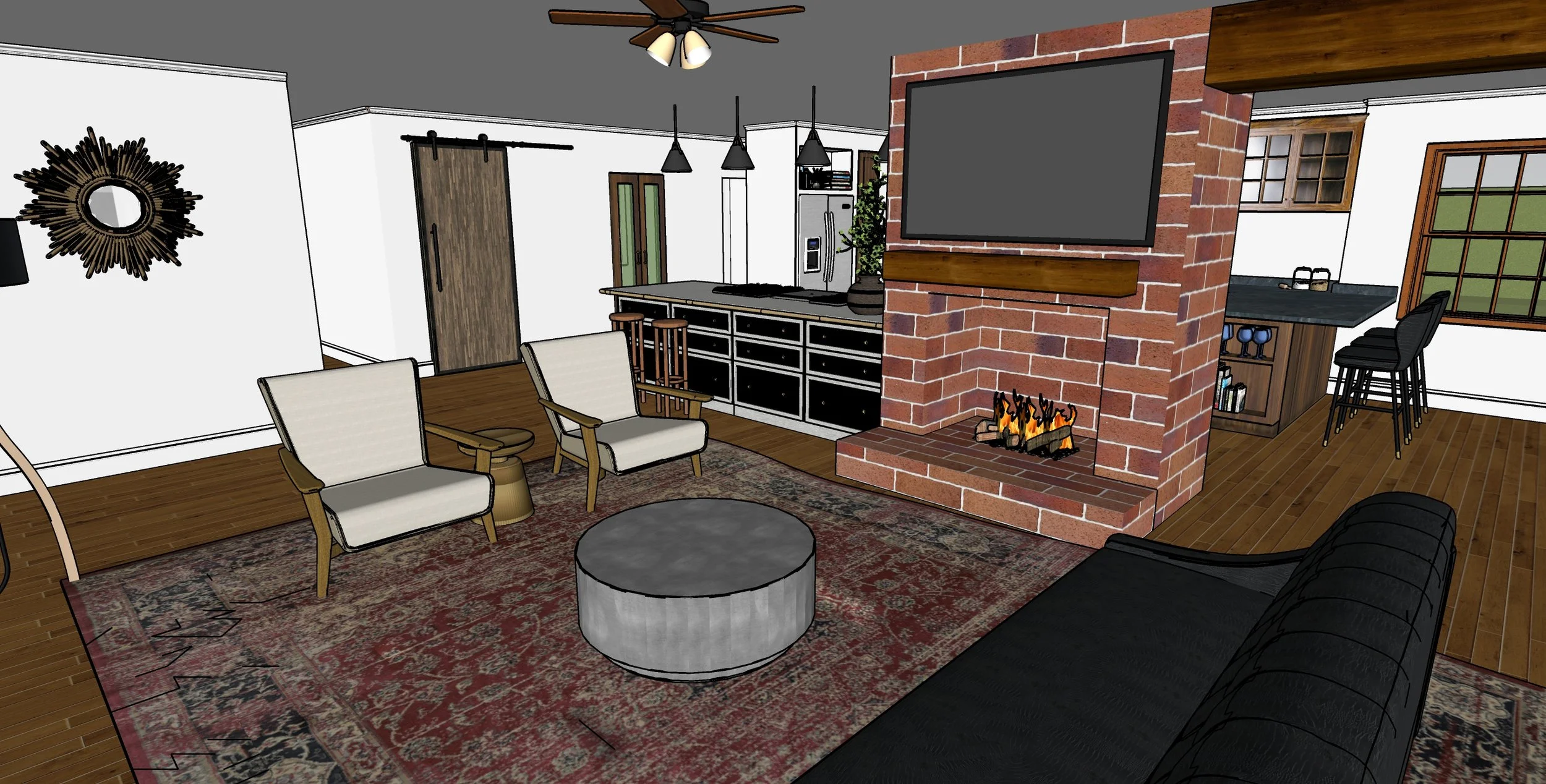 Living room with stone fireplace, brick wall, mounted TV, white walls, dark wood flooring, beige armchairs, black couch, patterned rug, ceiling fan, kitchen area with bar stools, and large windows.