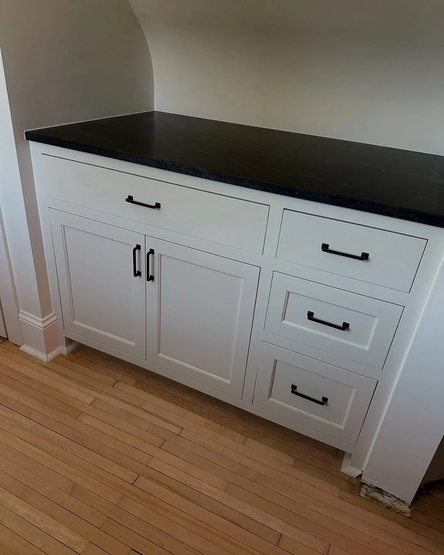 Thanks to homeowners who had a clear vision, we transformed this compact space into a cozy coffee bar and seating area, making it a great addition for the whole family.

Check out that custom radiator cover and finished end which provides easy access