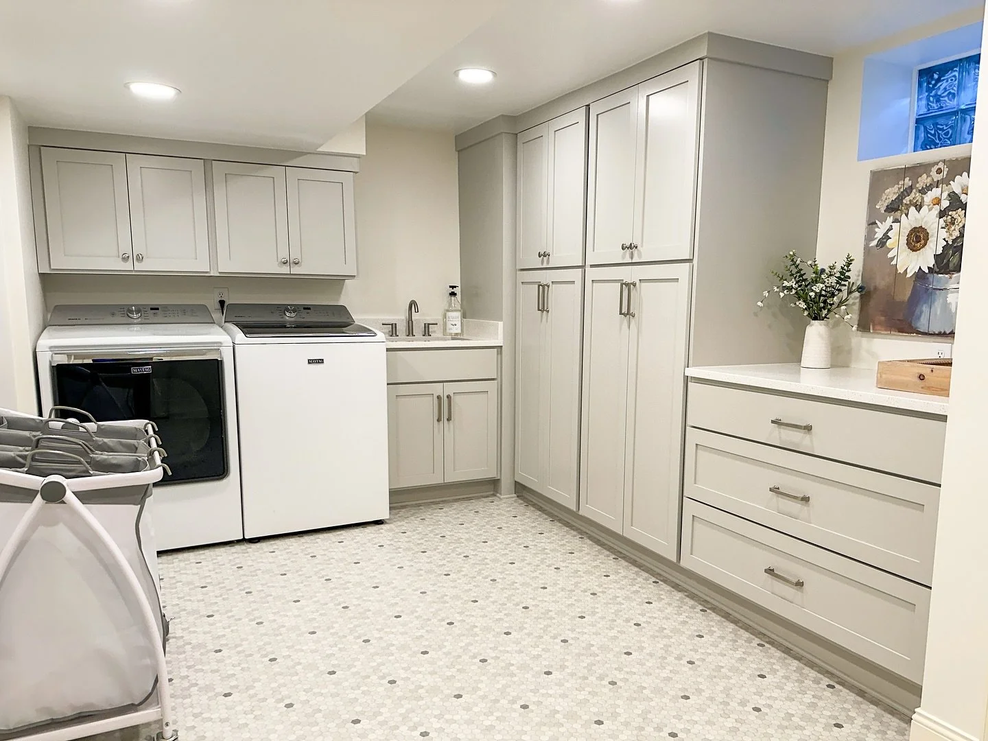 While the laundry room may not be the most glamorous space in the home, this bright new space might just make washing clothes, dare I say, tolerable.

Gotta love those before and after photos.

Contracting &amp; Design: @solidgroundconstructionco
