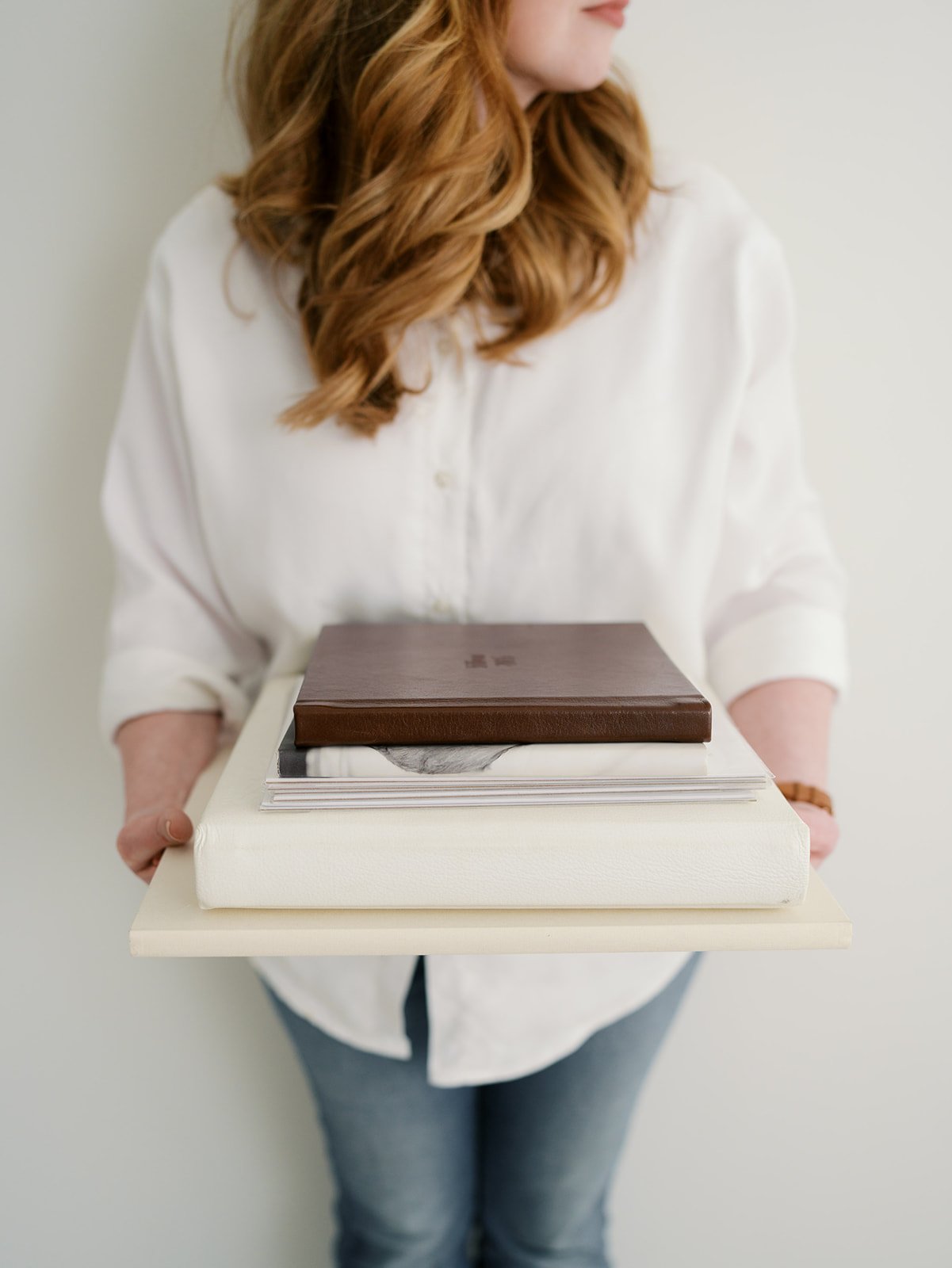 Heirloom albums and portrait products offered by Roanoke family photographer Liz Cook.
