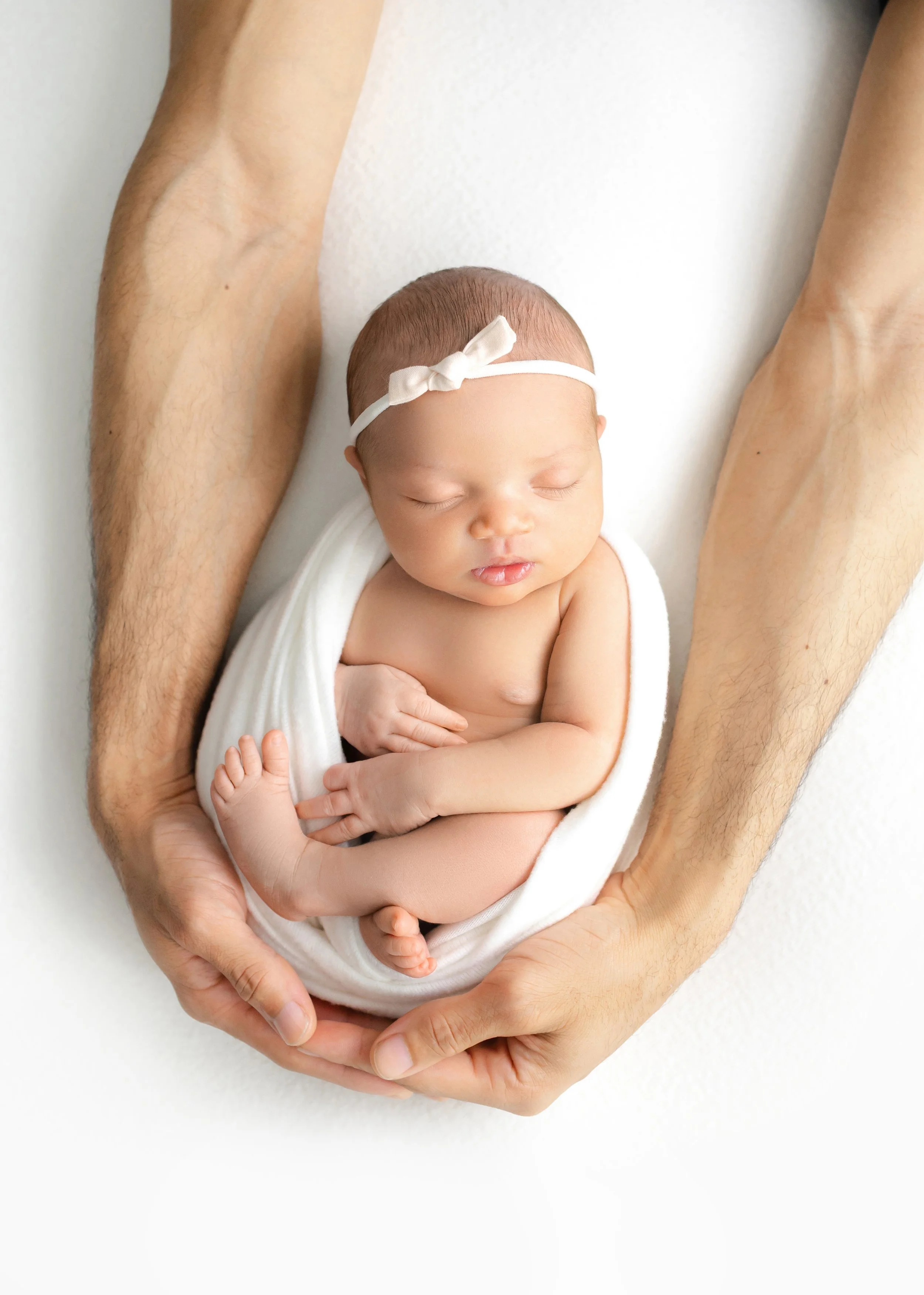 Newborn portrait session photographed by Roanoke newborn photographer Liz Cook.
