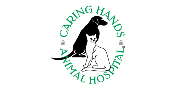 Logo for Caring Hands Animal Hospital with a paw print and a dog silhouette in the center.
