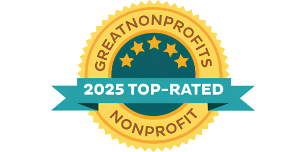 Gold and blue badge that reads 'Great Nonprofits Top-Rated 2025' with stars and ribbons.