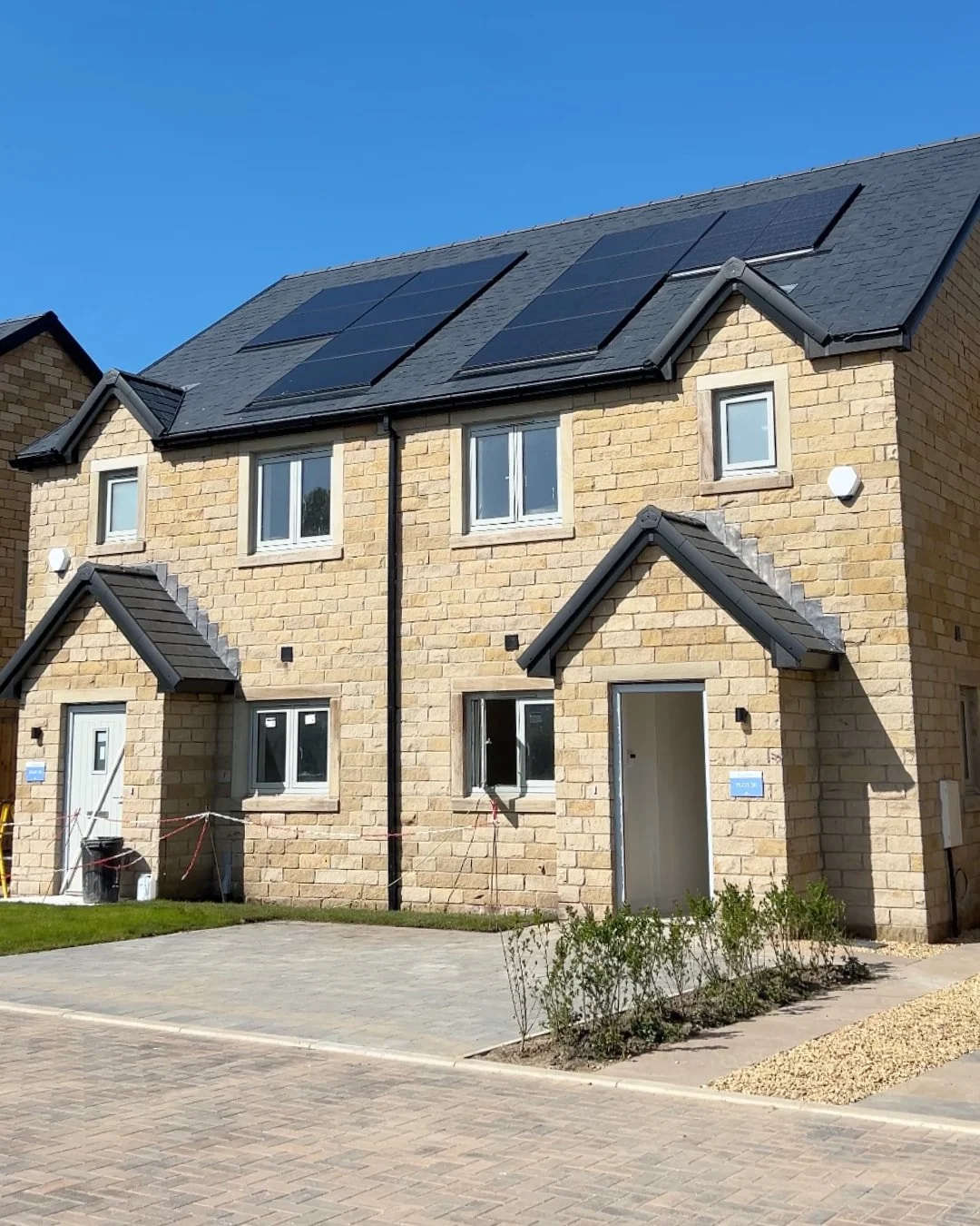 Residential solar panel installation on new build house roof in the UK