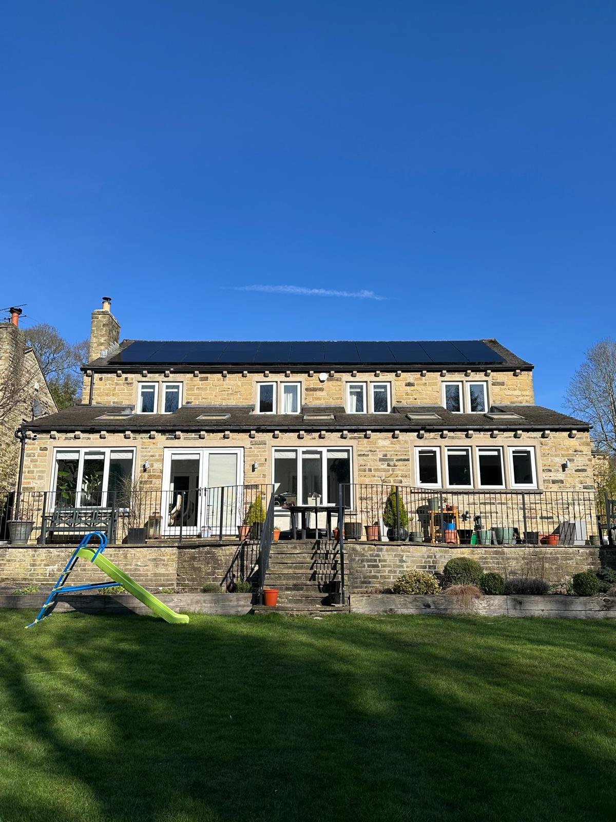 Detached home with in-roof solar panels installed by P4 Solar