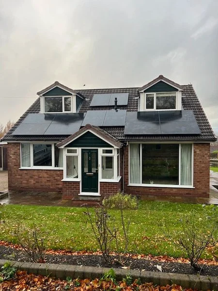 Detached bungalow with solar panels installed on the roof, Manchester