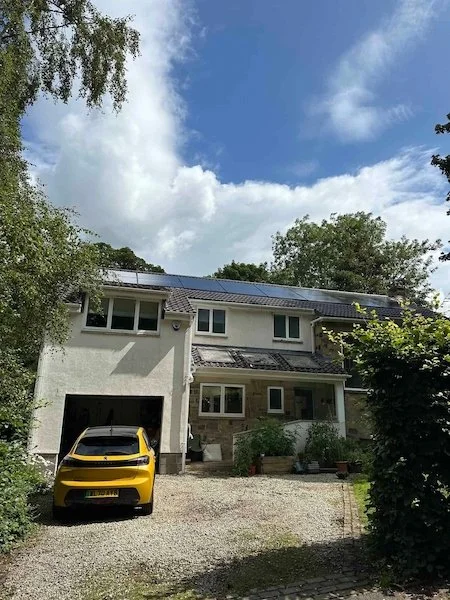 Detached house with solar panels installed on the roof, Ilkley