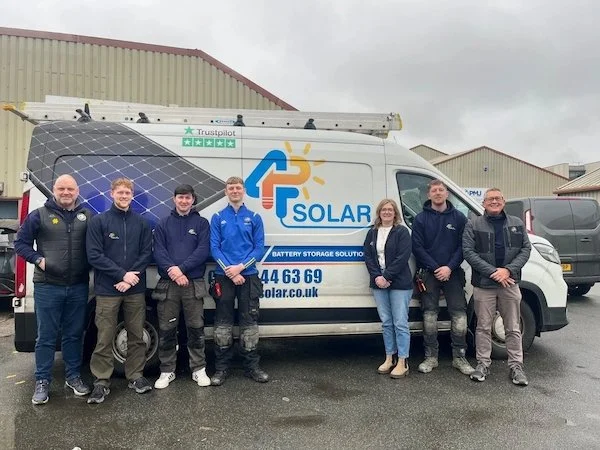 P4 Solar Team standing next to a P4 van