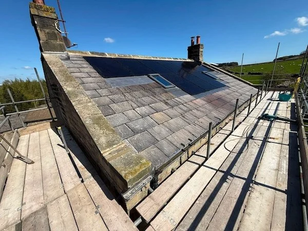 Close-up aerial view of solar panels installed on a slate roof, Harrogate