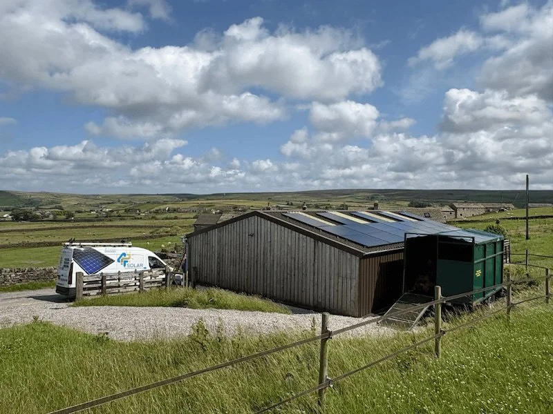 Agricultural barn with rooftop solar panels installed for farm energy generation by P4 Solar.