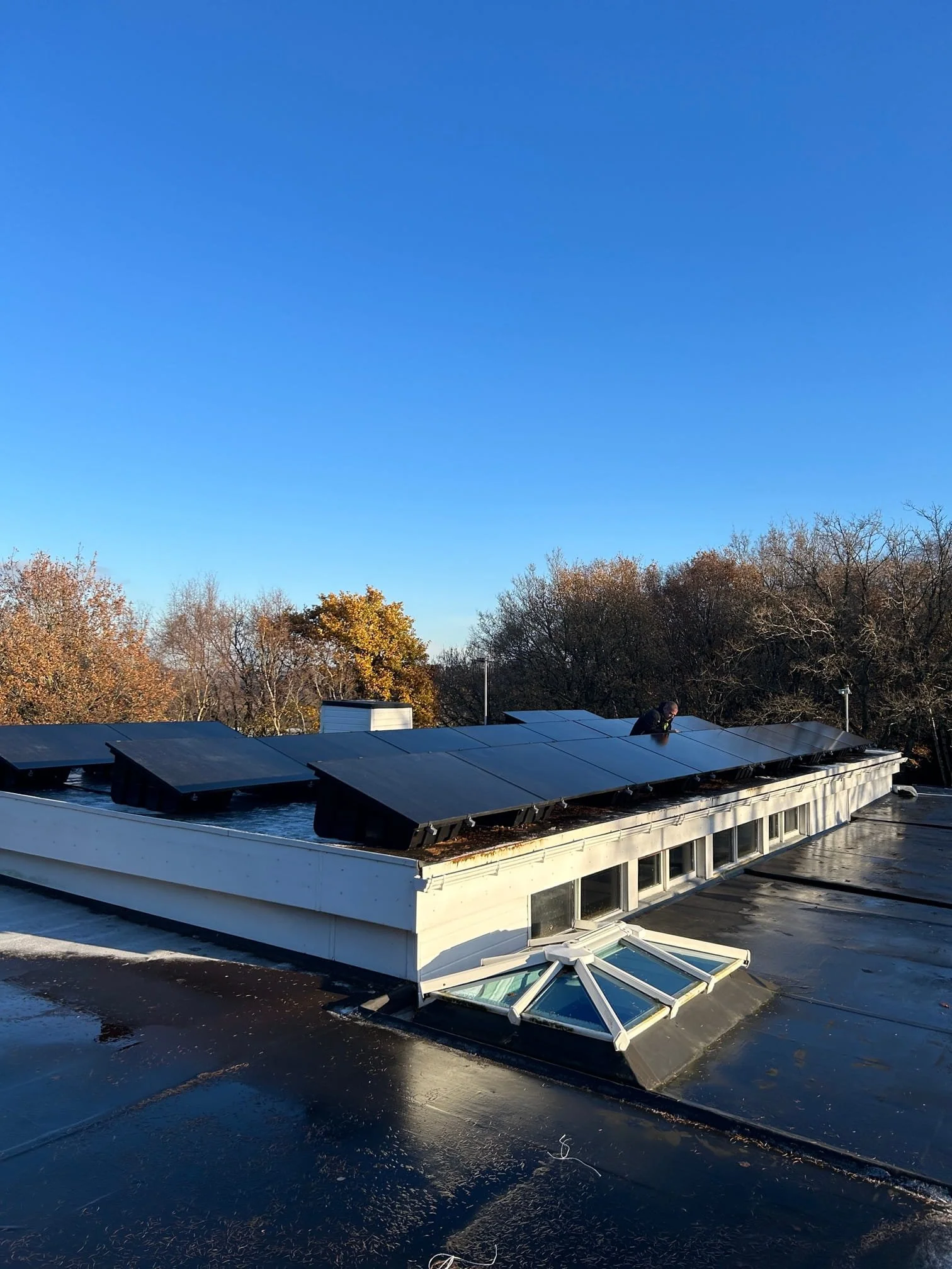 Flat roof solar panel system on commercial building