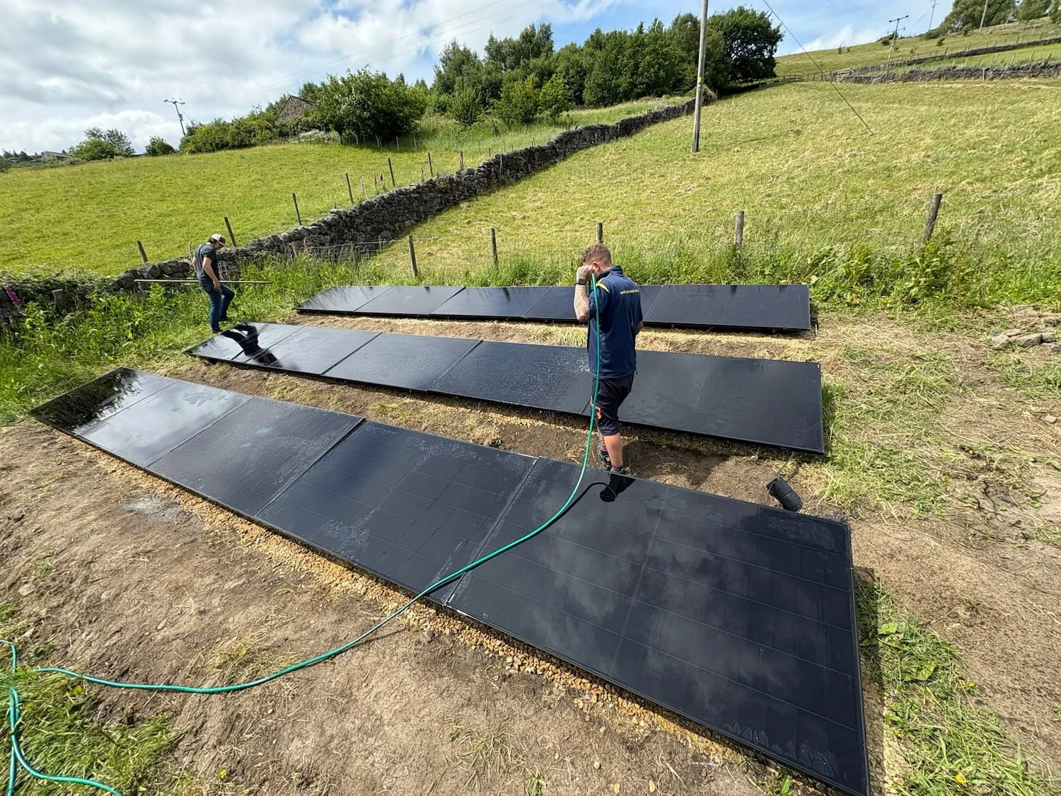 Ground mounted solar panels installed in the grounds of a residential property