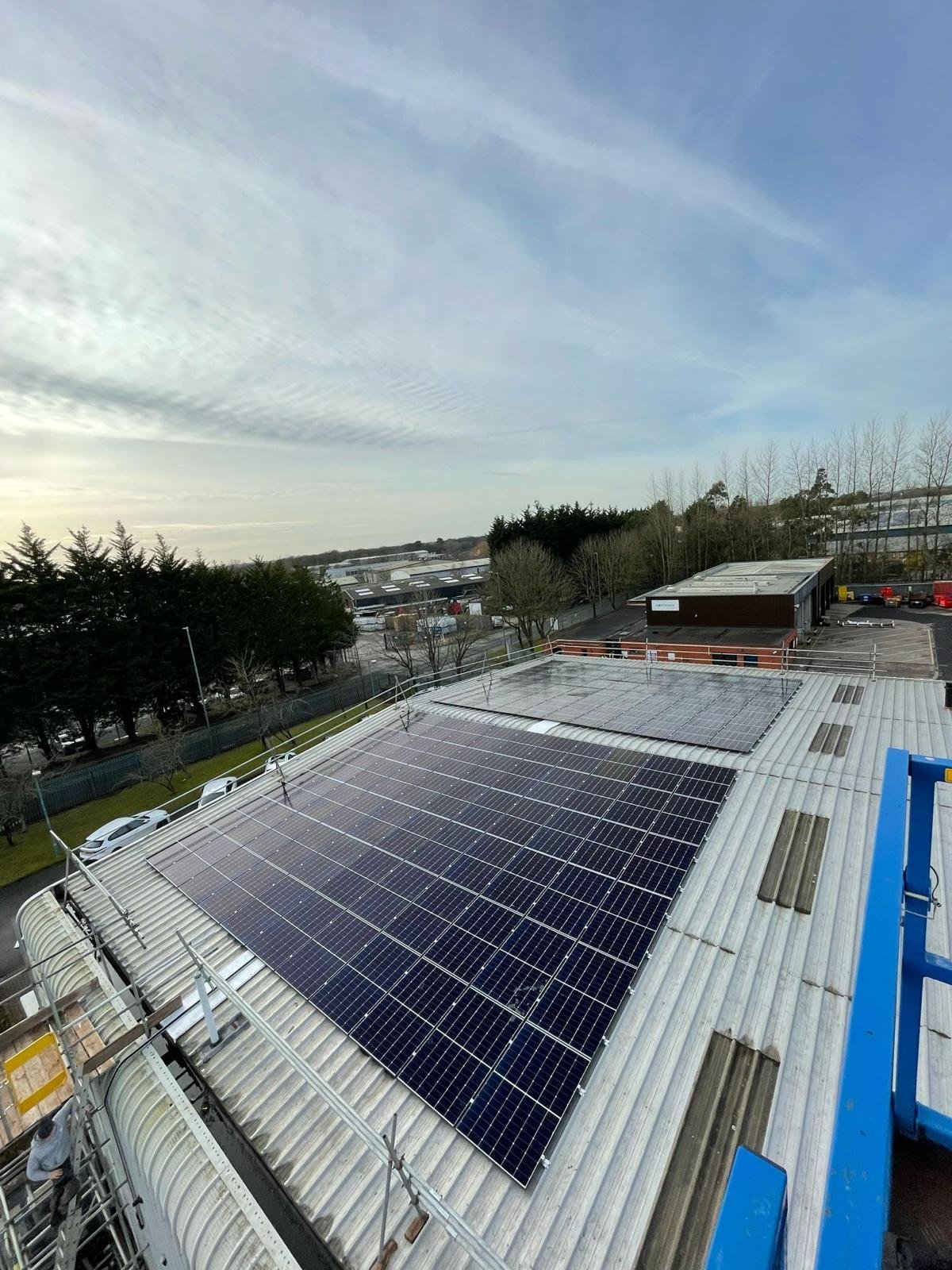 Commercial rooftop solar panel installation completed by P4 Solar on an industrial building.