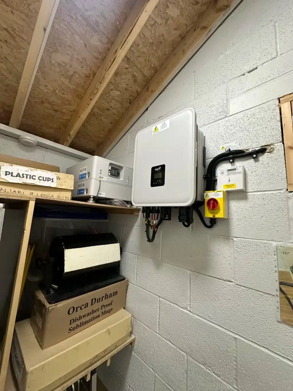 Solar battery storage system and hybrid inverter installed by P4 Solar inside Burley in Wharfedale Scout and Guide Group building.