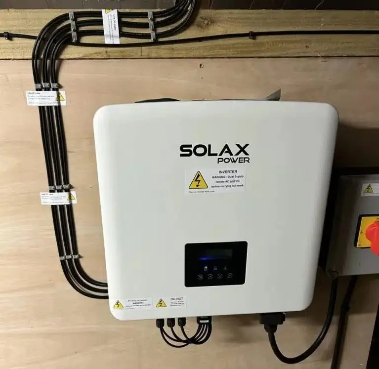 SolaX hybrid inverter installed as part of AFC Monton's solar energy system, enabling efficient energy conversion and future battery storage integration.