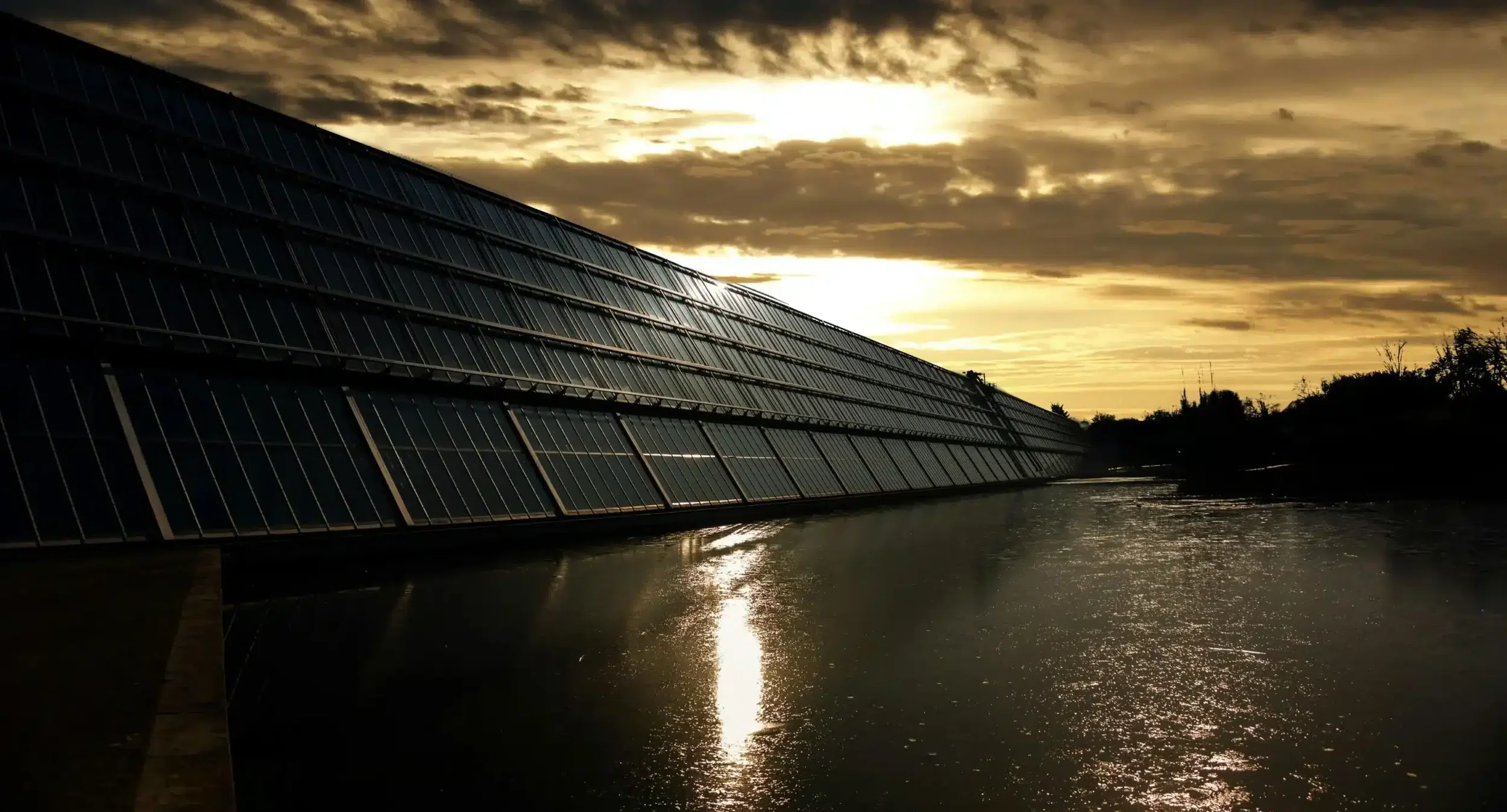 Solar panel array producing electricity in cloudy weather conditions