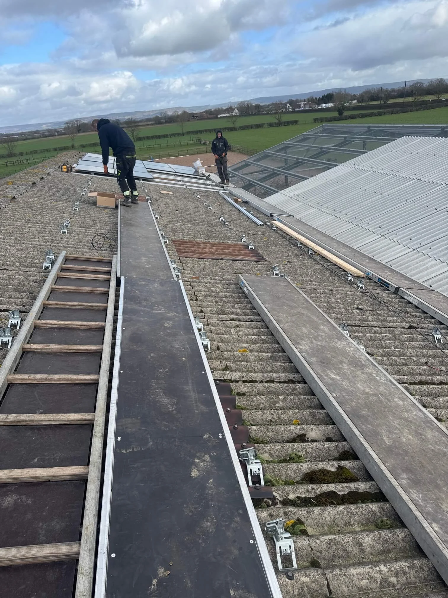 Solar installation of panels on aviary roof